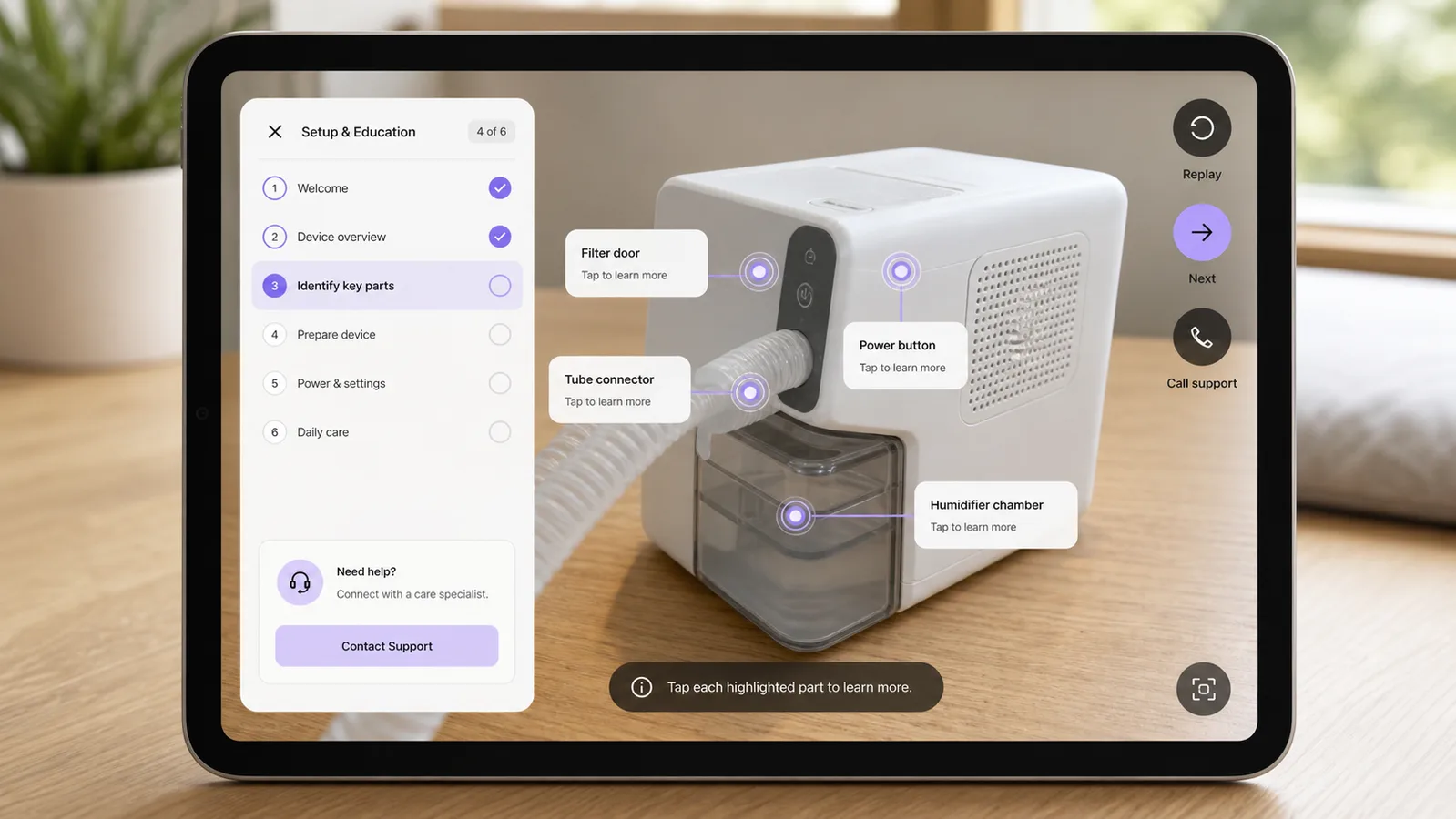 Tablet AR app showing guided setup hotspots on a respiratory device.